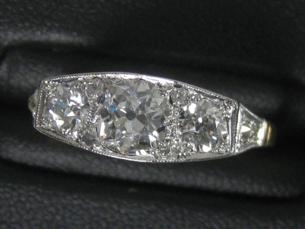 Appraisal: An Art Deco style Diamond Ring the three principle circular-cut