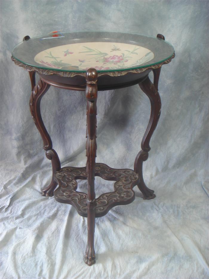 Appraisal: Swan carved continental lamp table with Chinese porcelain charger insert