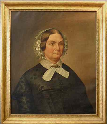 Appraisal: Oil on canvas portrait of a seated woman wearing a