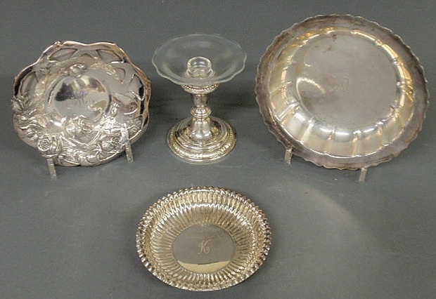 Appraisal: Three sterling silver dishes largest dia and a weighted candlestick