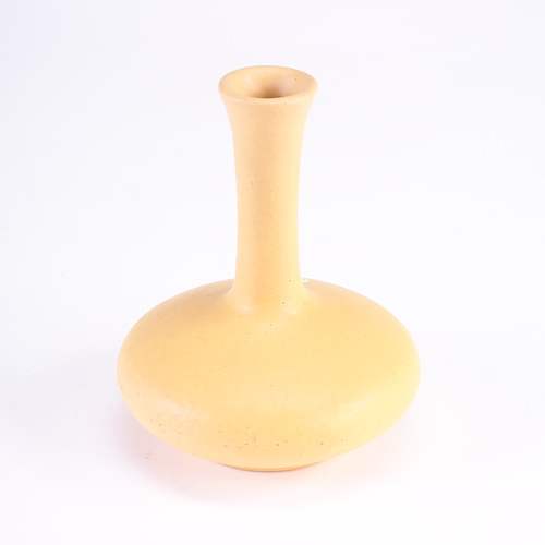 Appraisal: TECO Bottle-shaped vase covered in matte yellow glaze Stamped Teco