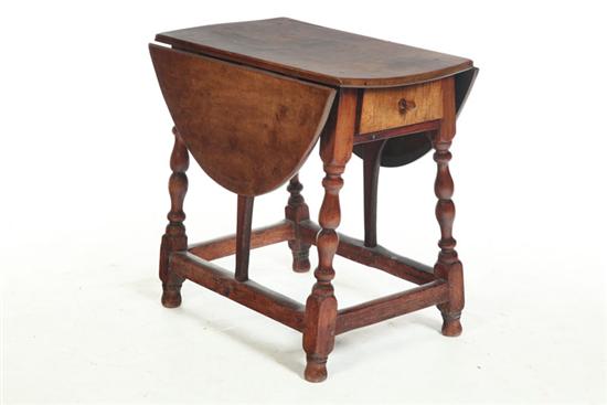 Appraisal: ''BUTTERFLY'' TABLE New England th century maple with some curl