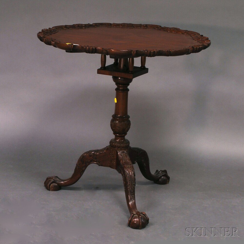 Appraisal: Bussolini Bros Chippendale-style Mahogany Piecrust Tea Table the shell and