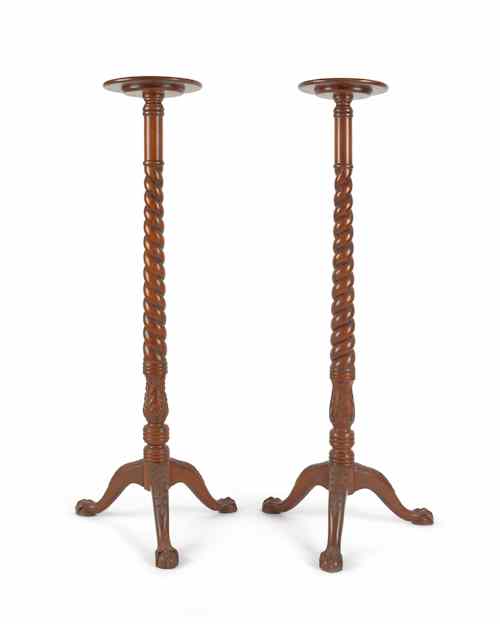 Appraisal: Pair of mahogany pedestals th c with rope twist shaft