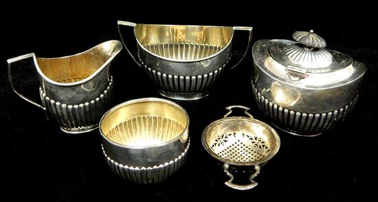 Appraisal: STERLING five pieces English fluted holloware creamer London covered sugar