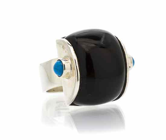 Appraisal: A Sterling Silver Onyx and Turquoise Ring Mexico containing a