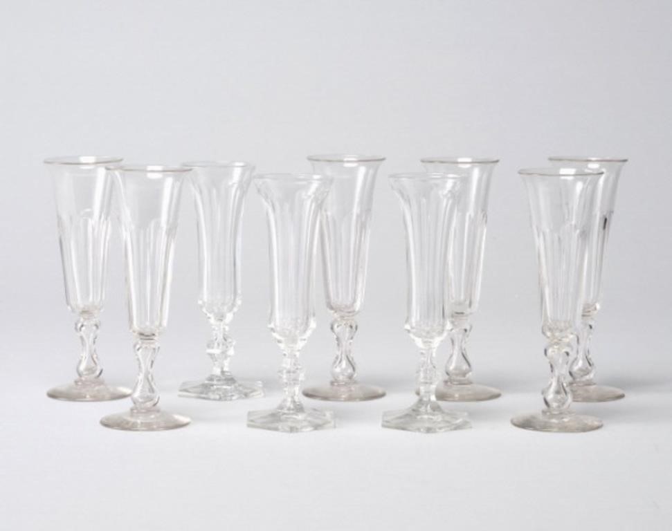 Appraisal: A group of nine cut crystal champagne flutes all with