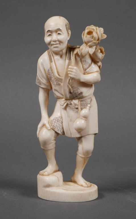 Appraisal: ANTIQUE JAPANESE CARVED IVORY FIGURINEFine old carving of Japanese man