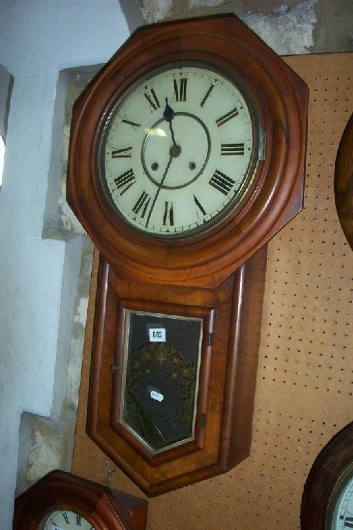 Appraisal: A th century figured walnut drop dial wall clock with