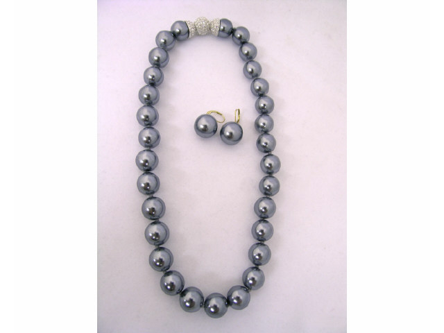 Appraisal: Faux pearl gray necklace with crystal accented magnetic clasp and