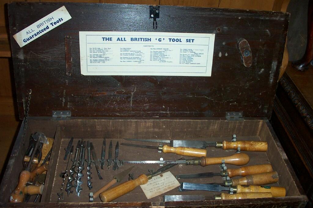 Appraisal: A pine chest containing a quantity of various woodworking tools