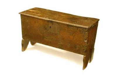 Appraisal: A Charles I boarded oak chest of tapered form the