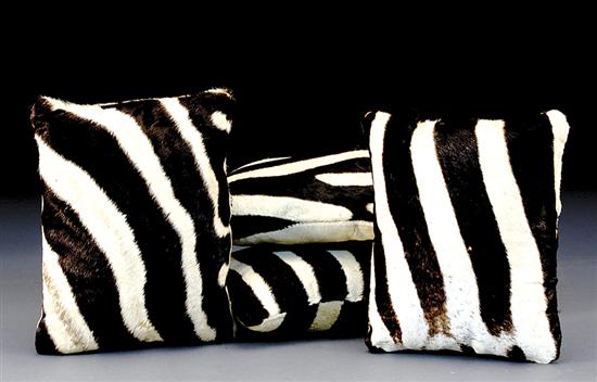 Appraisal: Four Zebra hide pillows x Small areas of hair loss