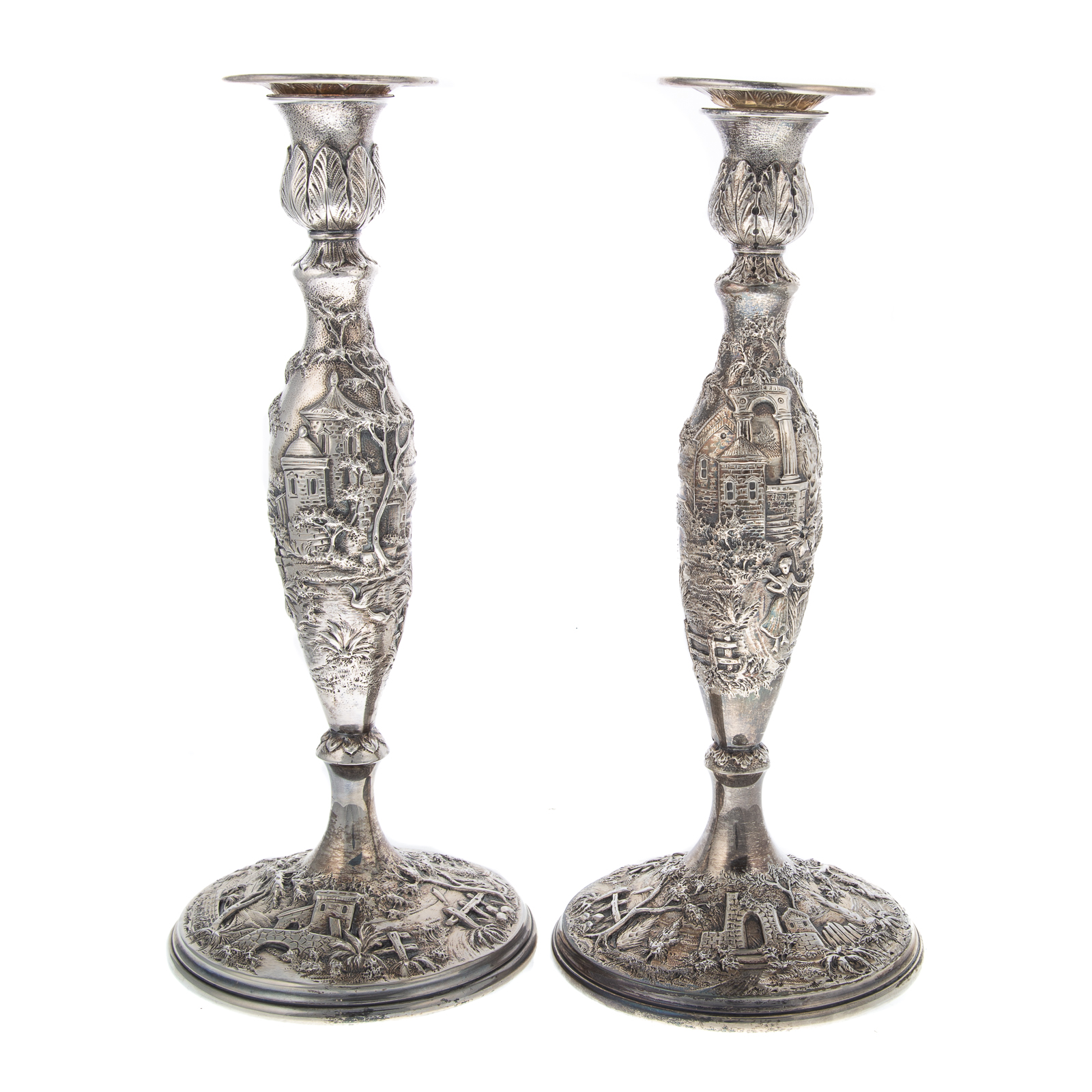 Appraisal: A PAIR OF S KIRK SON INC STERLING CASTLE CANDLESTICKS