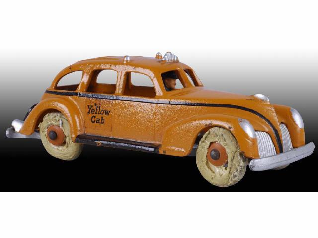 Appraisal: Cast Iron Orange Black Hubley Taxi Cab Toy Description Circa