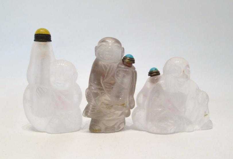 Appraisal: THREE CHINESE CRYSTAL SNUFF BOTTLES depicting human figures in various