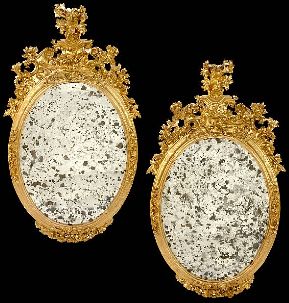 Appraisal: Each later oval plate with an exuberantly carved frame overall