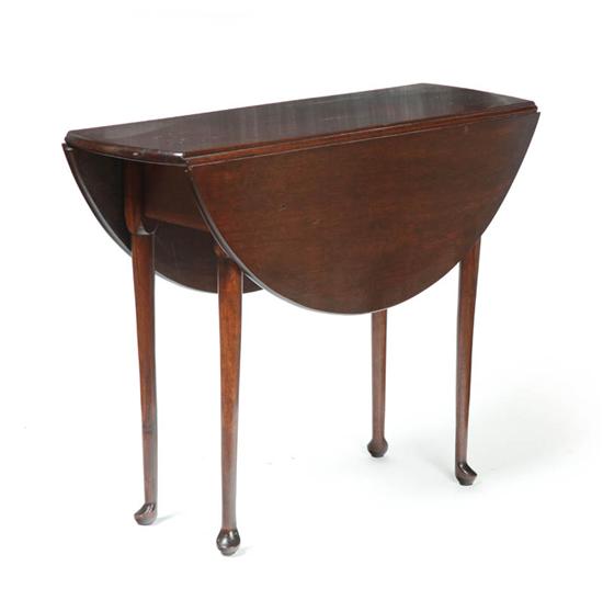 Appraisal: QUEEN ANNE DROP LEAF TABLE American th century walnut maple