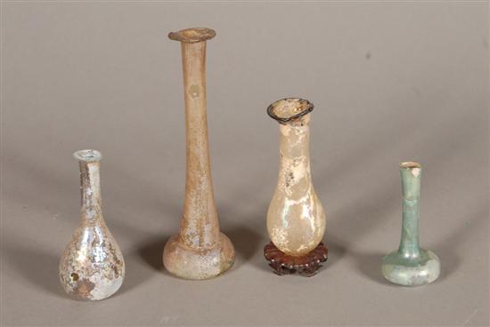 Appraisal: ANCIENT GLASS A group of four Roman iridescent glass vessels