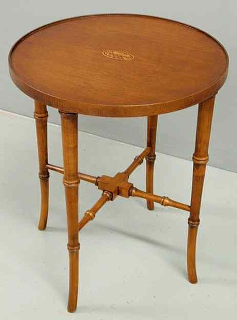 Appraisal: Baker Furniture inlaid mahogany table with a round top and