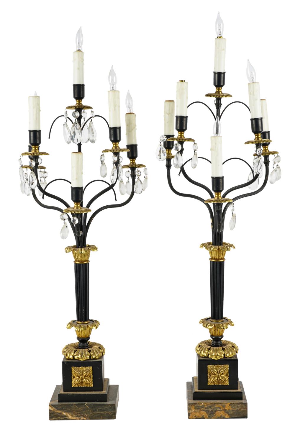 Appraisal: PAIR OF EMPIRE STYLE CANDELABRA TABLE LAMPS th century ebonized