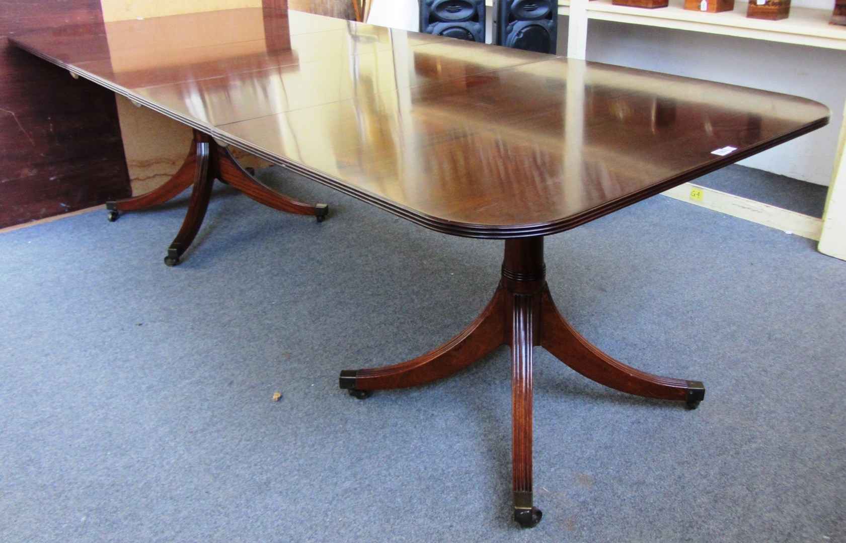 Appraisal: A William Tillman twin pedestal mahogany extending dining table on