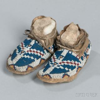 Appraisal: Cheyenne Arapaho Beaded Hide Child's Moccasins c s with thick