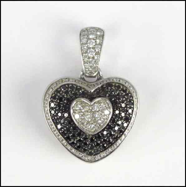 Appraisal: LEO PIZZO KARAT WHITE GOLD BLACK AND WHITE DIAMOND HEART