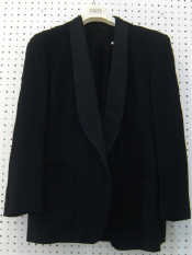 Appraisal: A Giorgio Armani black cocktail suit One button pure new