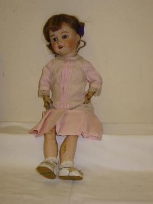 Appraisal: An A Lanternier Cie bisque head girl doll with blue