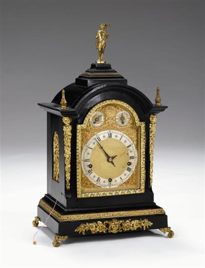 Appraisal: English ebonized and gilt bronze mounted bracket clock and shelf