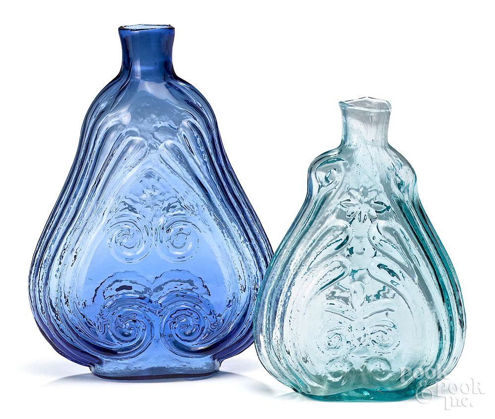 Appraisal: Two midwestern glass scroll flasks mid th c Two midwestern