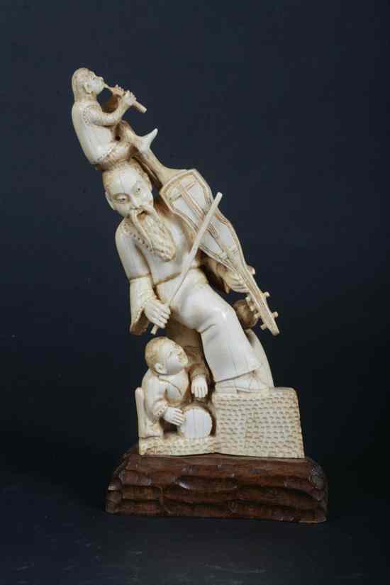 Appraisal: CHINESE IVORY FIGURAL GROUP Carved to depict musical group of