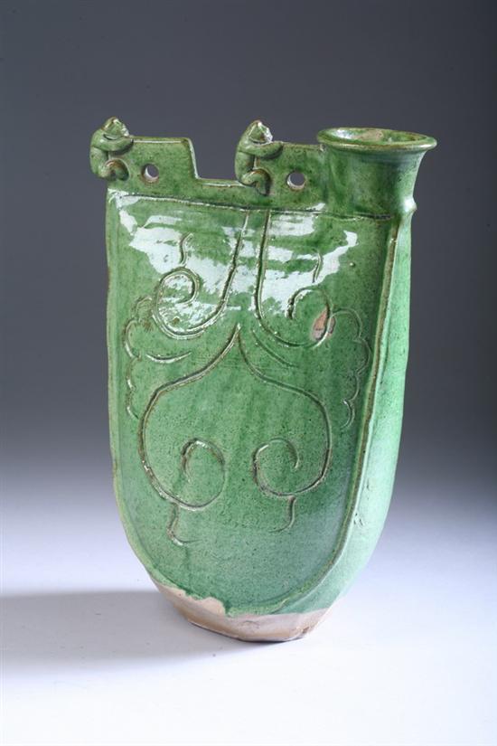 Appraisal: CHINESE GREEN GLAZED POTTERY FLASK Imitating leather water skins with