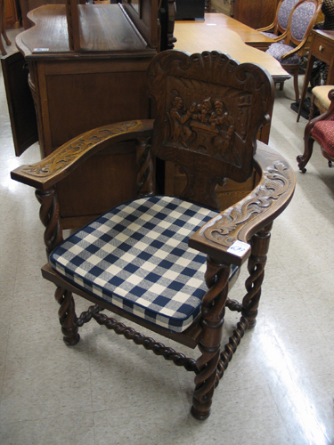 Appraisal: A CARVED OAK CAROLEAN REVIVAL ARMCHAIR English c The shield-shaped