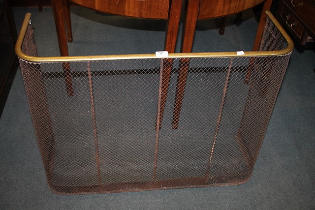 Appraisal: A VICTORIAN NURSERY BRASS FENDER with wire mesh guard cm