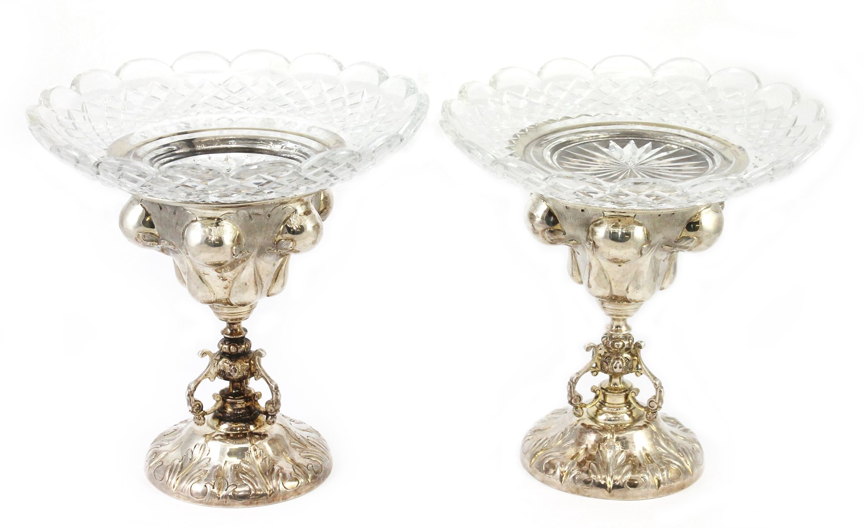 Appraisal: Two silver sweetmeat stands each of Baroque style decorated with