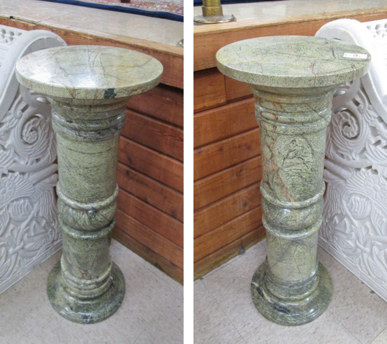 Appraisal: A PAIR OF VERDE SCURO MARBLE PEDESTALS round column form