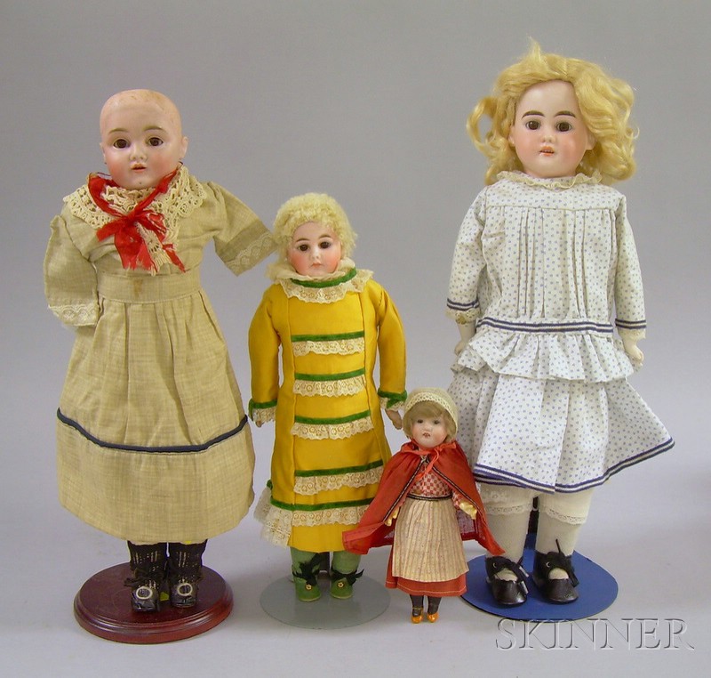 Appraisal: Four German Bisque Head Dolls