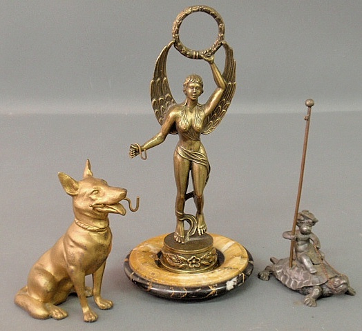 Appraisal: - Three pot metal watch holders including a French brass-clad