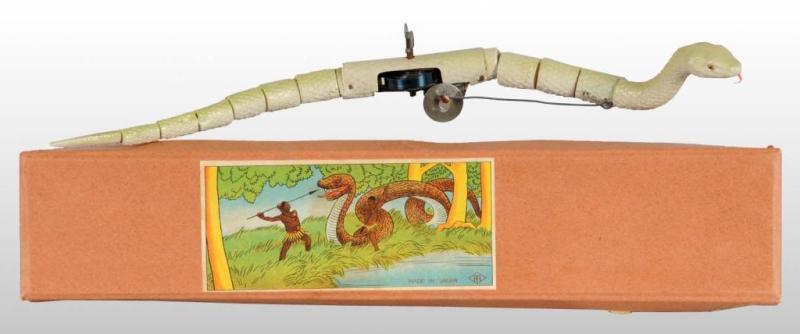 Appraisal: Celluloid Snake Wind-Up Toy Description Pre-war Japanese Scarce toy marked