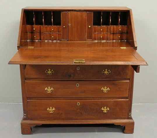 Appraisal: Chippendale walnut desk c the fully fitted interior with a