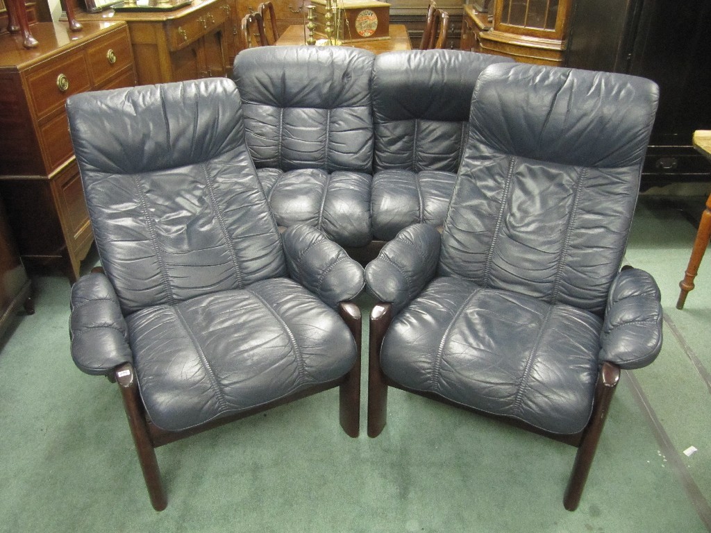 Appraisal: Stressless' blue leather settee with a pair of reclining armchairs