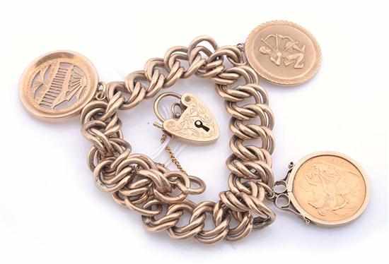 Appraisal: A DOUBLE CURBLINK PADLOCK CHARM BRACELET STAMPED CT GOLD WITH