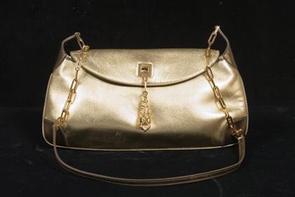 Appraisal: Gold metallic leather Gucci purse With bronze metallic leather accents