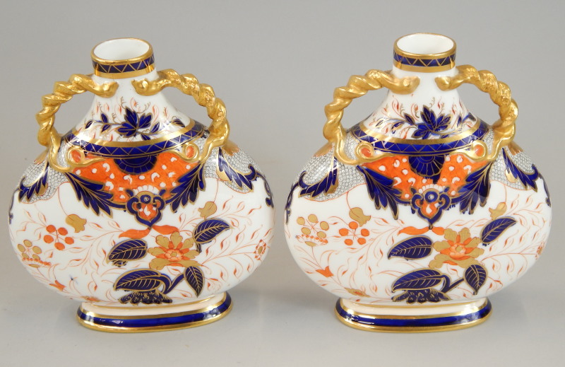 Appraisal: A pair of thC Davenport porcelain two handled moon flasks