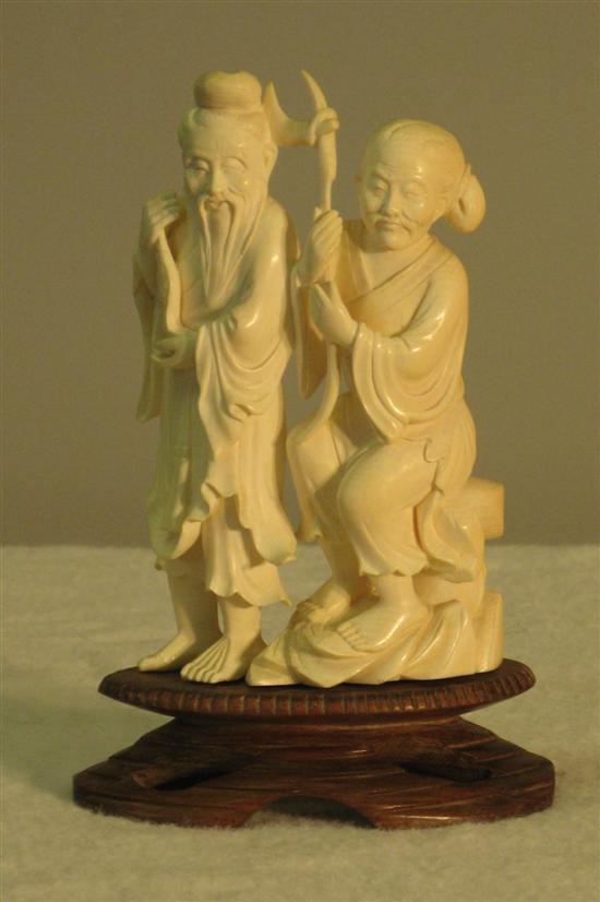 Appraisal: th century Chinese ivory figural group of two figures with