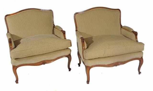 Appraisal: A PAIR OF FRENCH STYLE WALNUT FRAMED ARMCHAIRS with lose