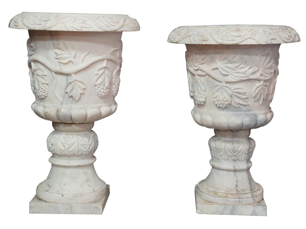 Appraisal: TWO LARGED CARVED MARBLE URNSCondition each with cracks and chips