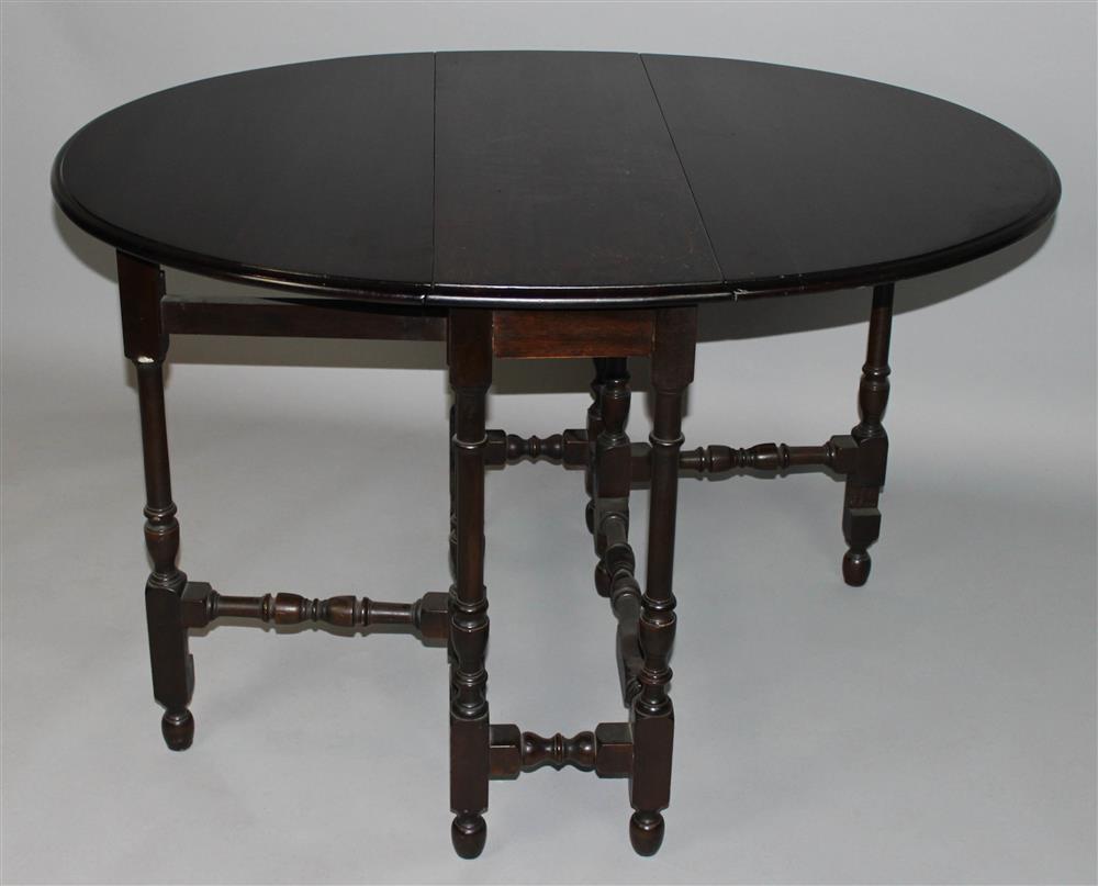 Appraisal: BAROQUE STYLE MAHOGANY DROP LEAF TABLE h w d in